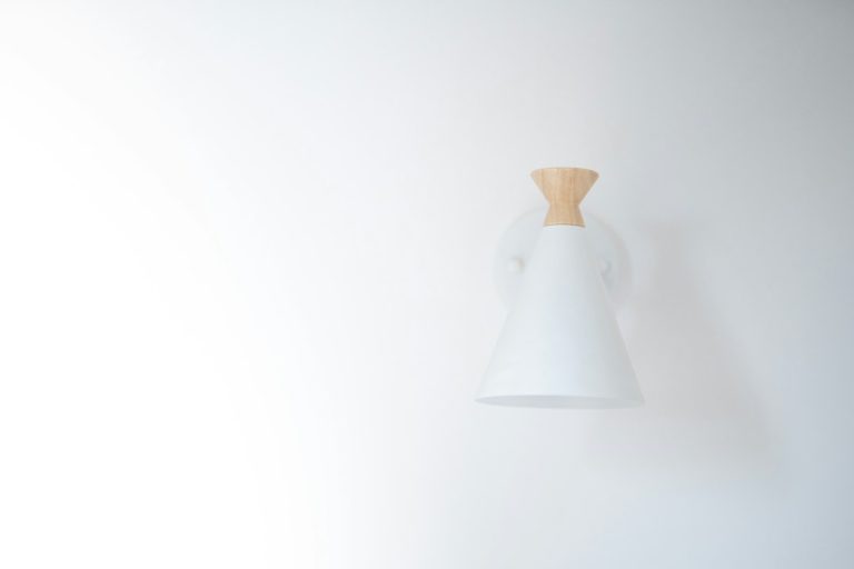 Innovative Color Changing Wall Sconce with Recycled Plastic Finish
